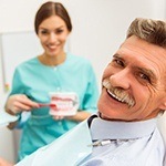 Male All-on-4 dental implant patient smiling